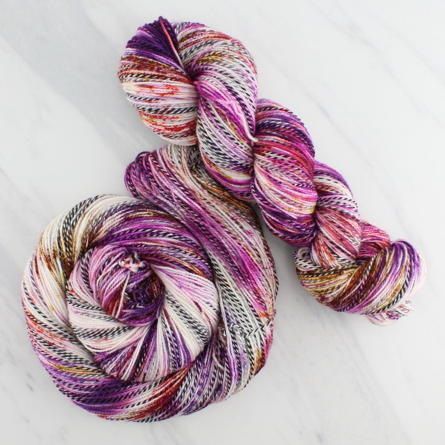 AUTUMN SUNSET Hand Dyed on Stained Glass Fingering - Splashed & Speckled Yarn