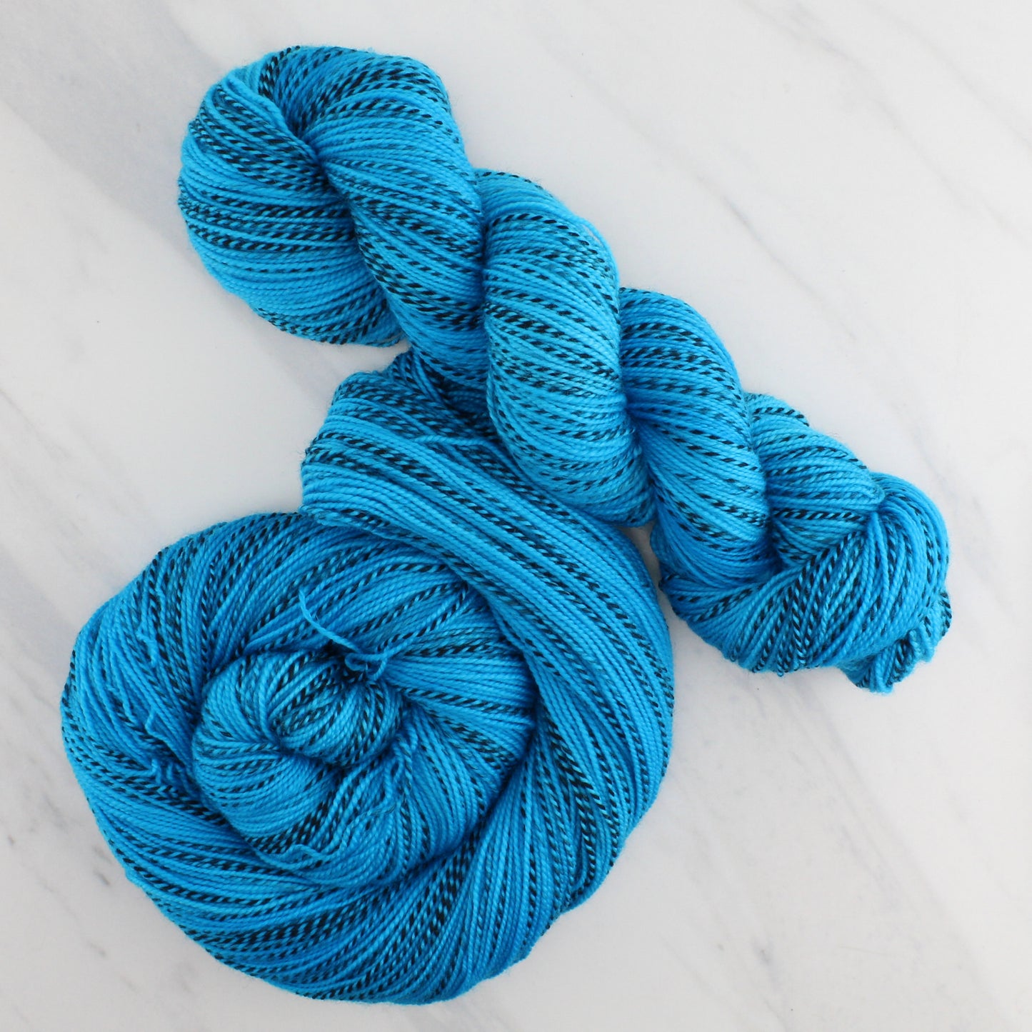 CARIBBEAN BLUE Hand Dyed on Stained Glass Fingering - Semi-Solid Colorway