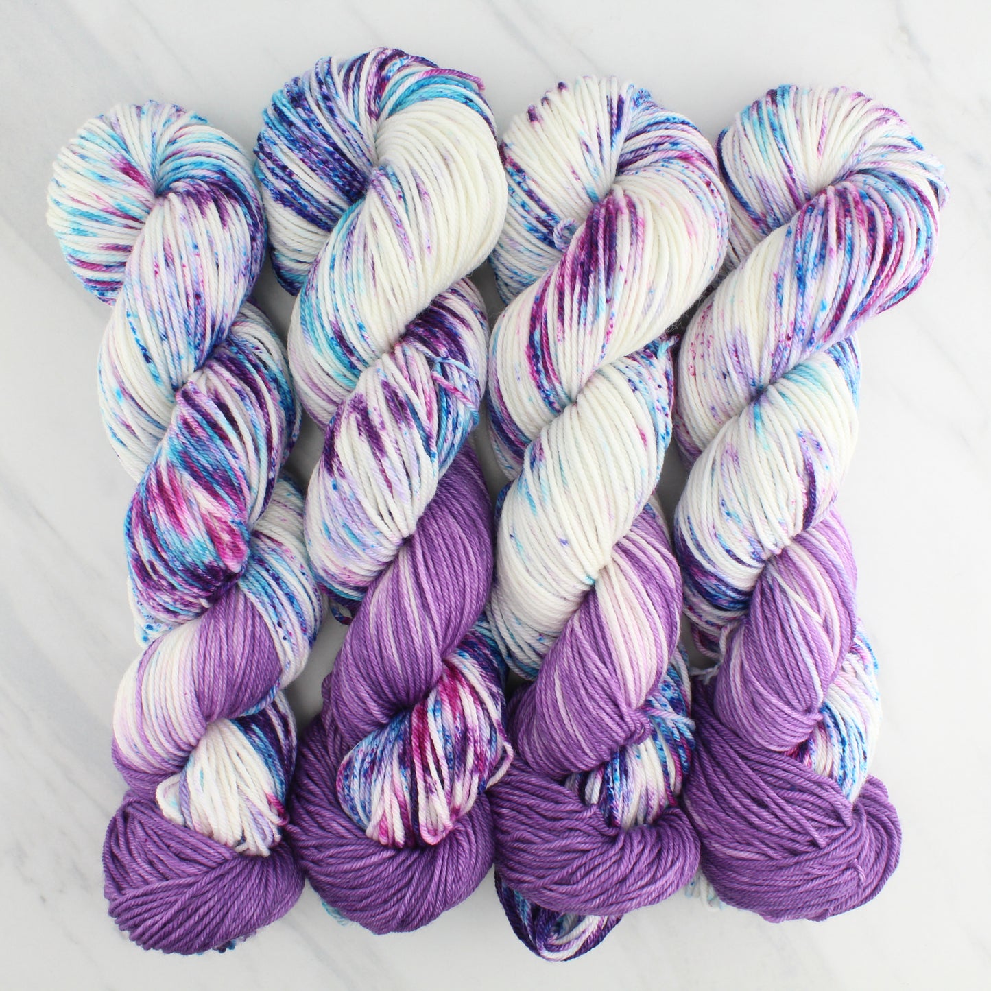 CARNEVALE Hand Dyed on Squoosh DK - Assigned Pooling Yarn
