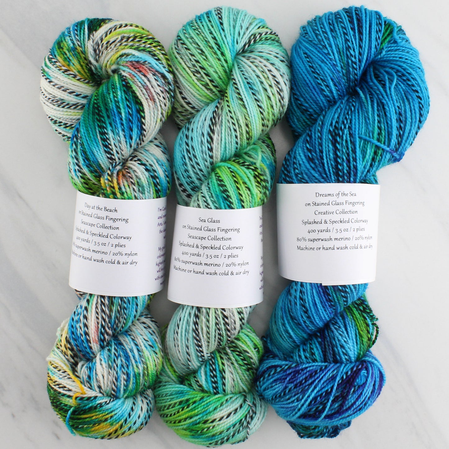 DAY AT THE BEACH - Hand Dyed on Stained Glass Fingering - Splashed & Speckled Yarn