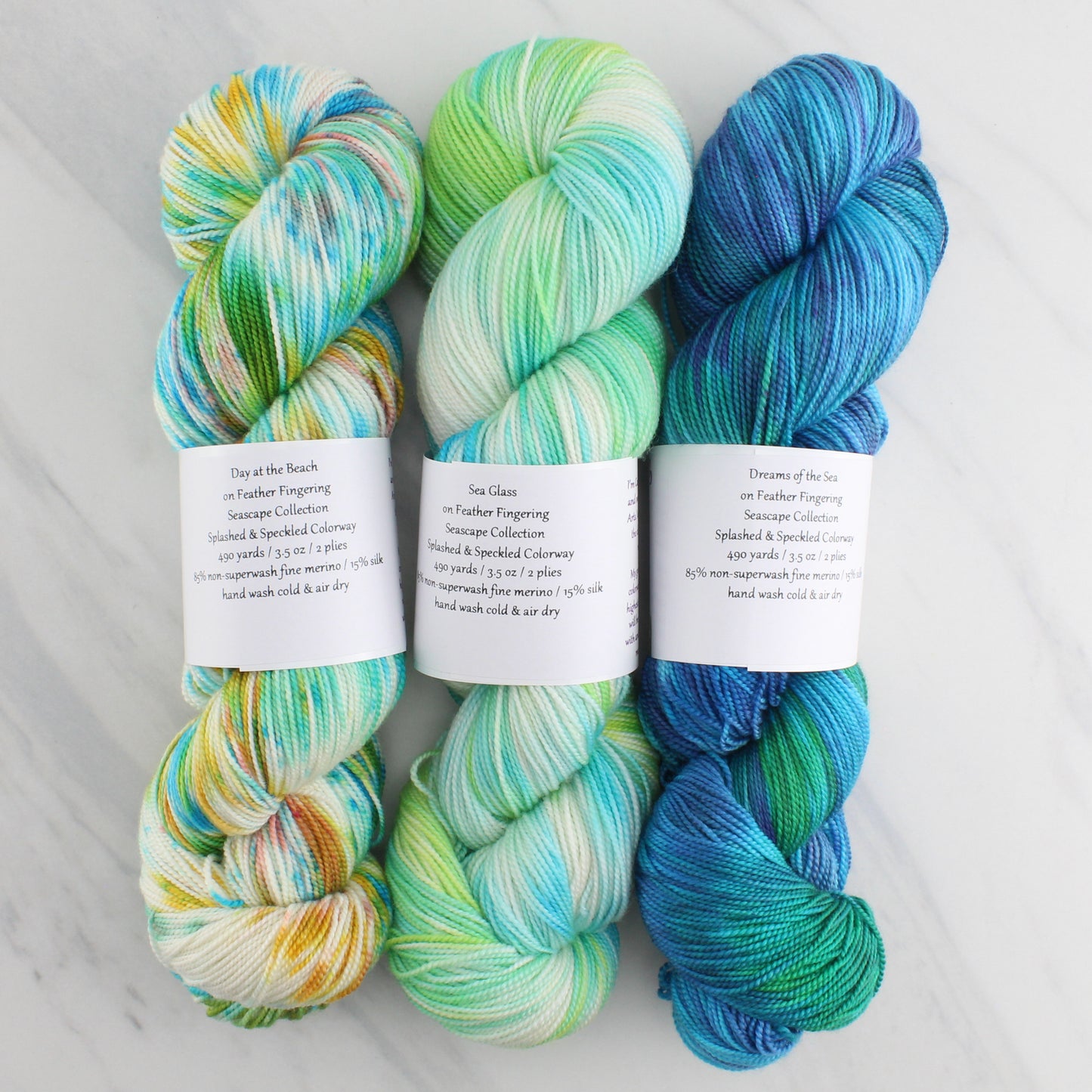 DAY AT THE BEACH Hand Dyed on Feather Fingering - Splashed & Speckled Yarn
