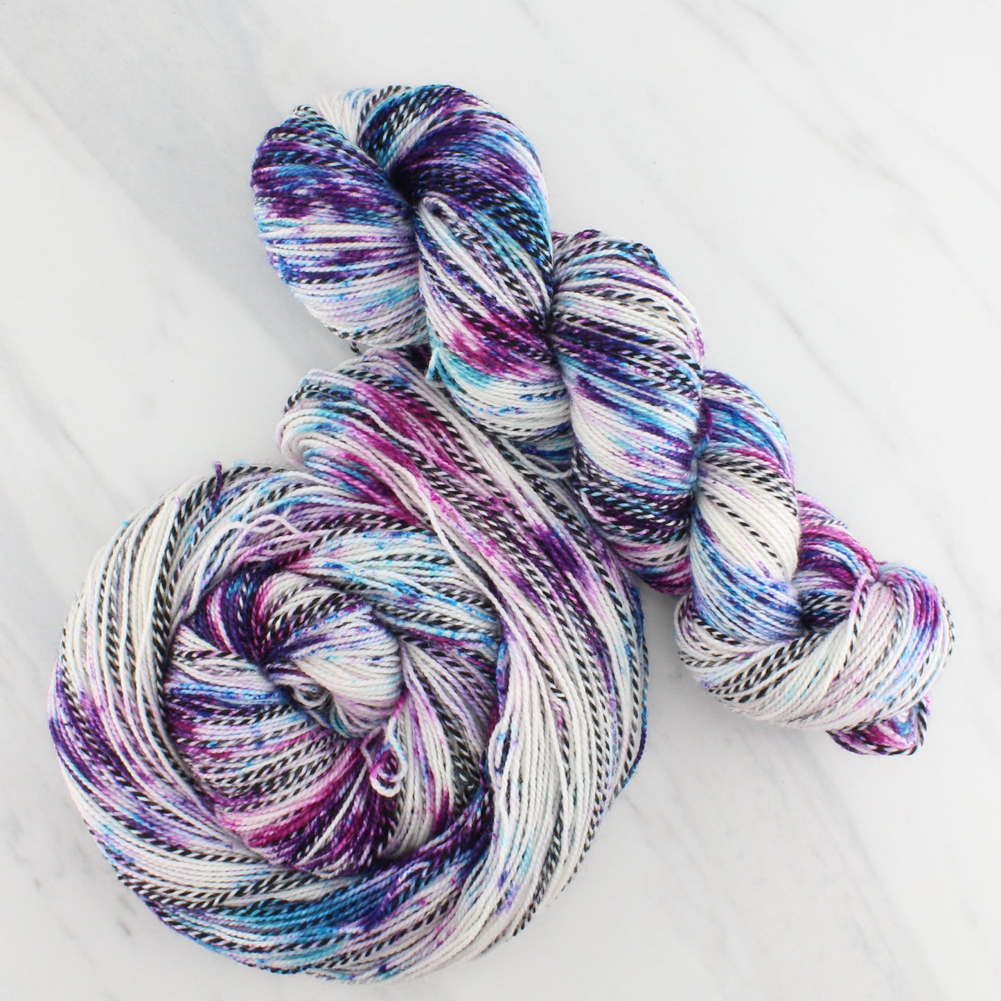 MONET Hand Dyed on Stained Glass Fingering - Splashed & Speckled Yarn