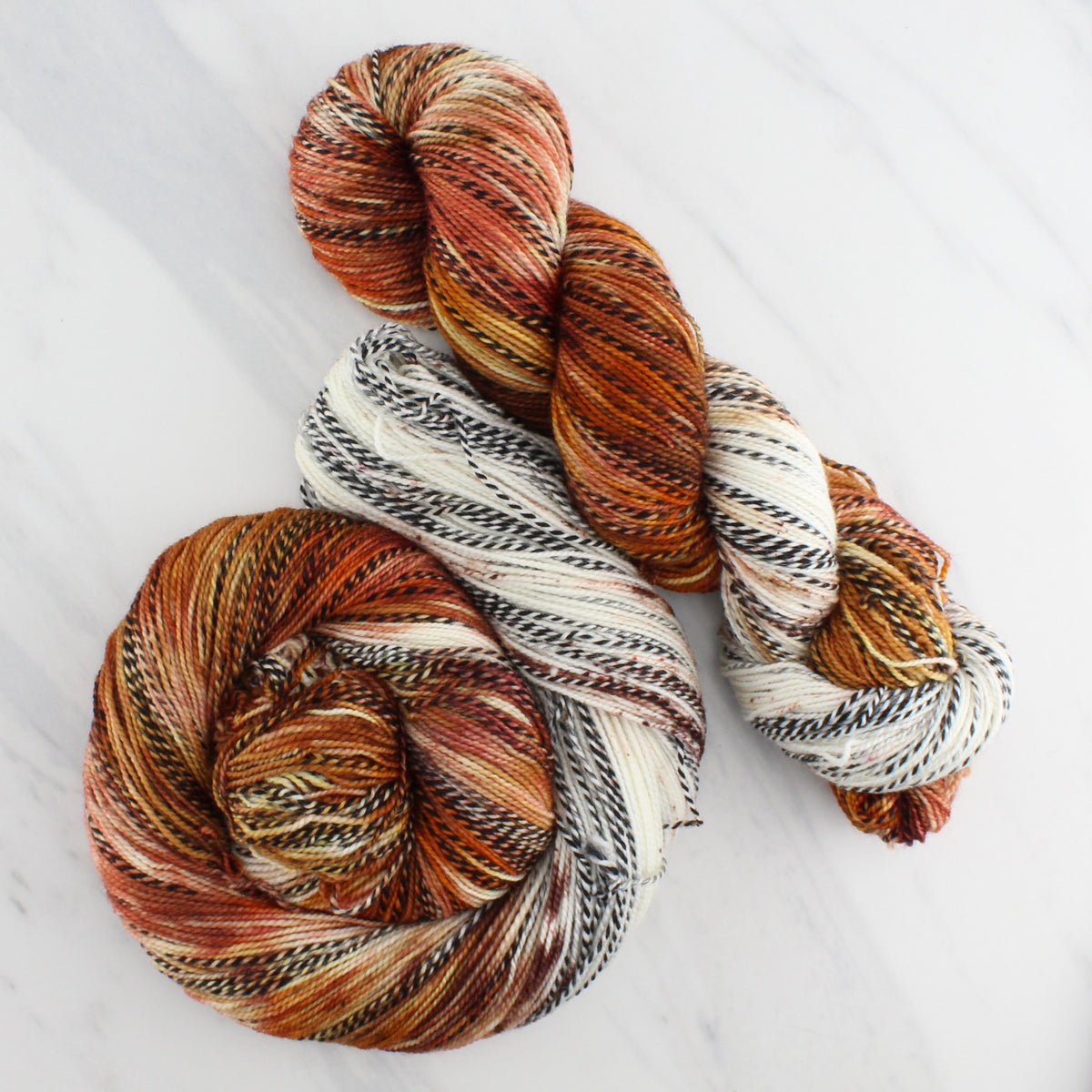 PUMPKIN SPICE LATTE on Stained Glass Fingering - Assigned Pooling Colorway