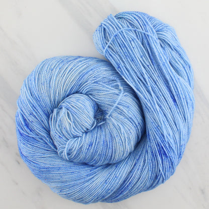 ALPINE BLUE Hand Dyed on Feather Fingering - Semi-Solid Colorway with Speckles