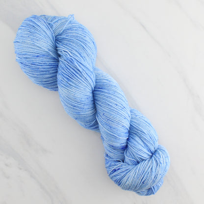 ALPINE BLUE Hand Dyed on Feather Fingering - Semi-Solid Colorway with Speckles