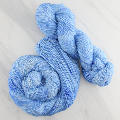 ALPINE BLUE Hand Dyed on Feather Fingering - Semi-Solid Colorway with Speckles