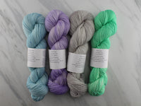 AS YOU WISH by Mary Annarella of Lyrical Knits - CURATED YARN SET #6 with Violet Gelato, Mint Gelato, Blueberry Gelato and Gelato Scoop on Feather Sock