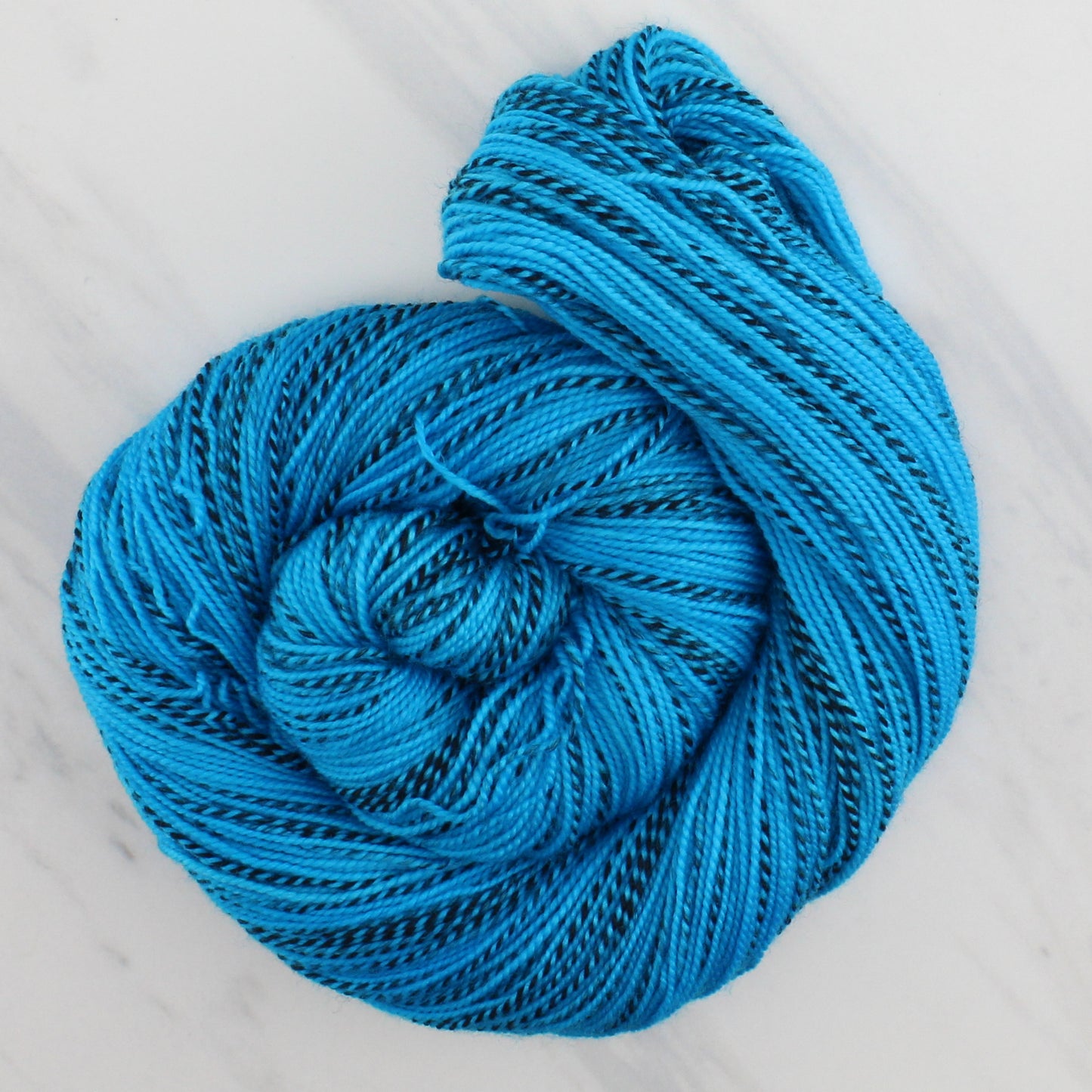 CARIBBEAN BLUE Hand Dyed on Stained Glass Fingering - Semi-Solid Colorway