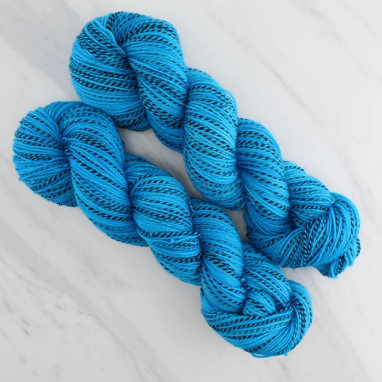 CARIBBEAN BLUE Hand Dyed on Stained Glass Fingering - Semi-Solid Colorway