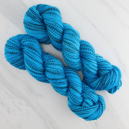 CARIBBEAN BLUE Hand Dyed on Stained Glass Fingering - Semi-Solid Colorway