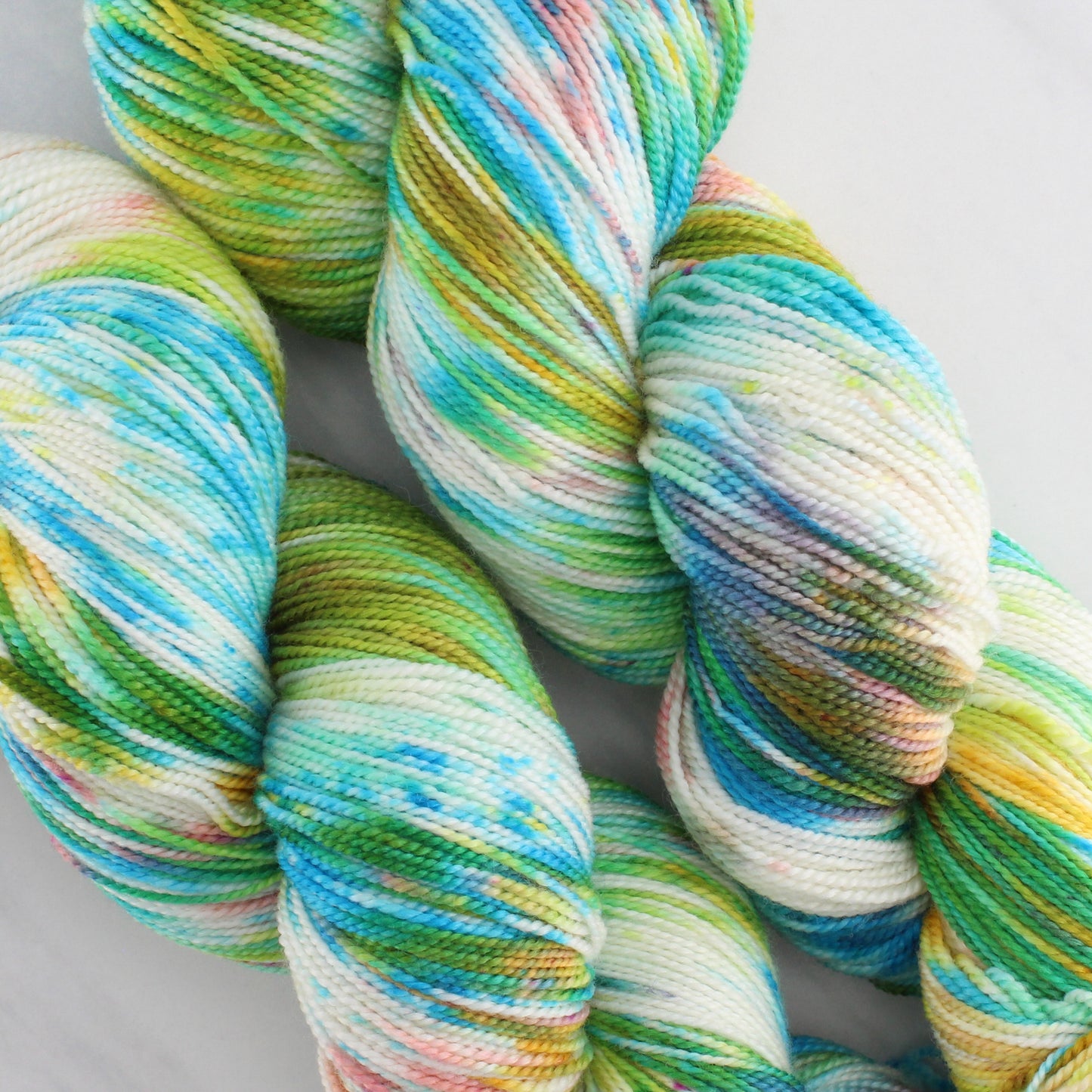 DAY AT THE BEACH Hand Dyed on Feather Fingering - Splashed & Speckled Yarn