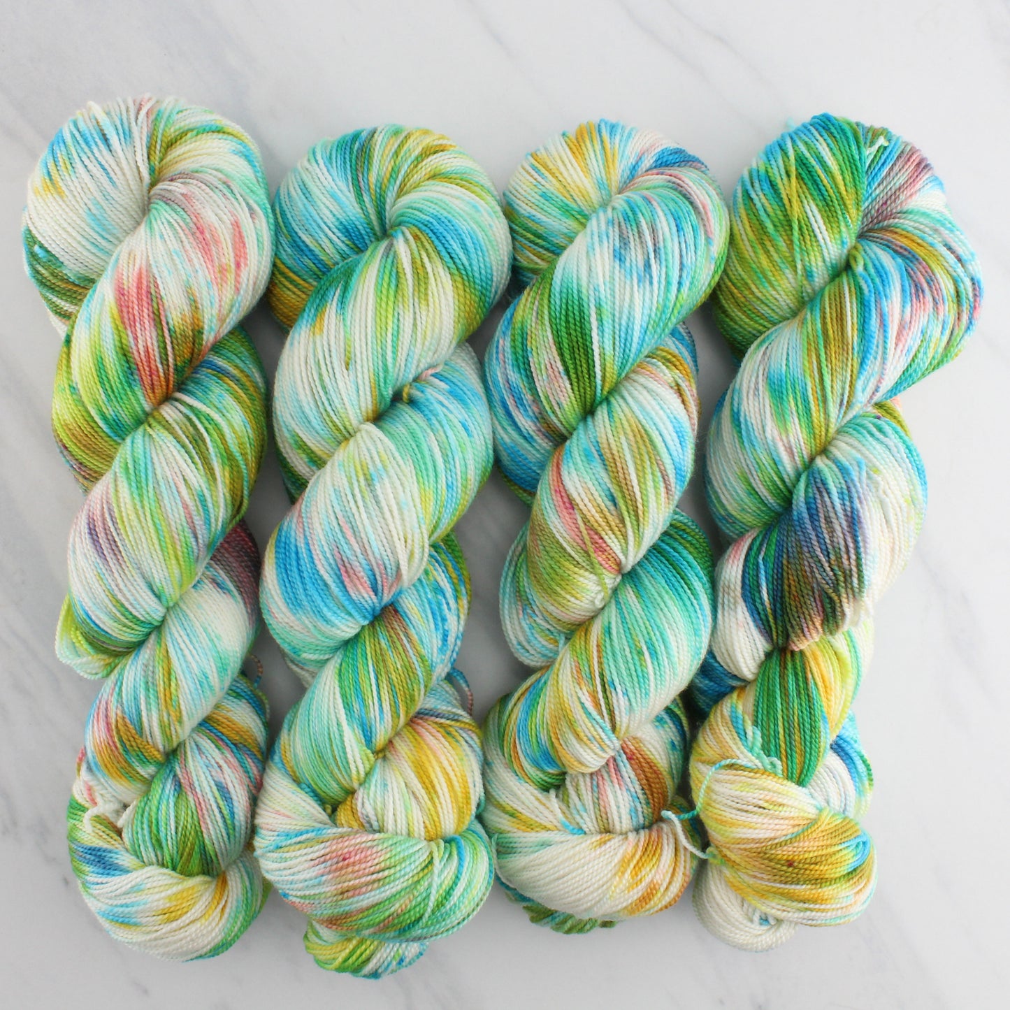 DAY AT THE BEACH Hand Dyed on Feather Fingering - Splashed & Speckled Yarn