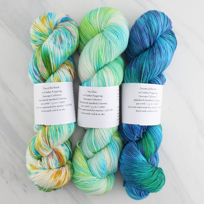 DAY AT THE BEACH Hand Dyed on Feather Fingering - Splashed & Speckled Yarn