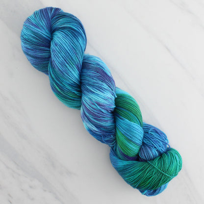 DREAMS OF THE SEA Hand Dyed on Feather Fingering - Splashed & Speckled Yarn