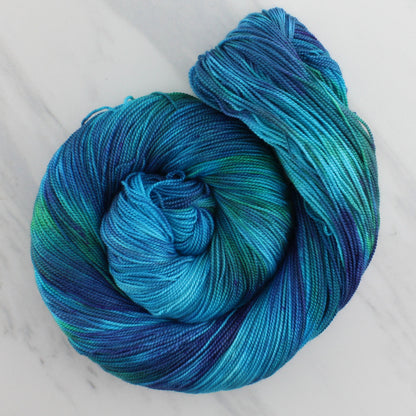 DREAMS OF THE SEA Hand Dyed on Feather Fingering - Splashed & Speckled Yarn