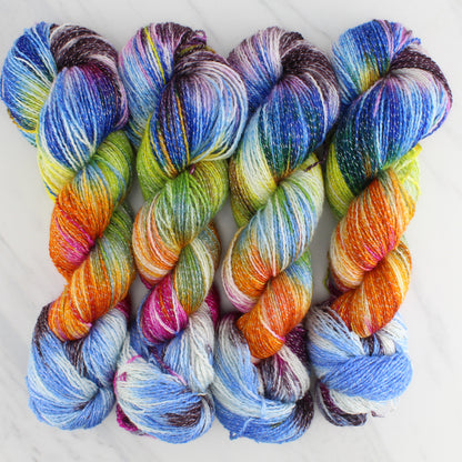 JONES' LES VENDEUSES DE TISSUE Hand Dyed on Twinkle Fingering  - Block Variegated Yarn