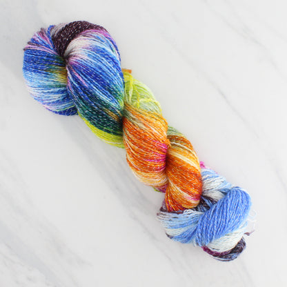 JONES' LES VENDEUSES DE TISSUE Hand Dyed on Twinkle Fingering  - Block Variegated Yarn