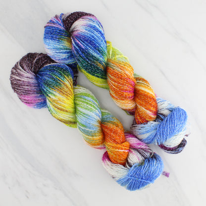 JONES' LES VENDEUSES DE TISSUE Hand Dyed on Twinkle Fingering  - Block Variegated Yarn