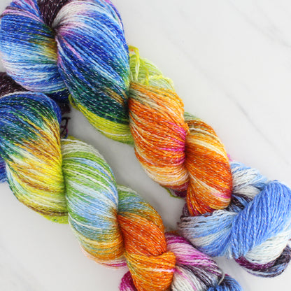 JONES' LES VENDEUSES DE TISSUE Hand Dyed on Twinkle Fingering  - Block Variegated Yarn