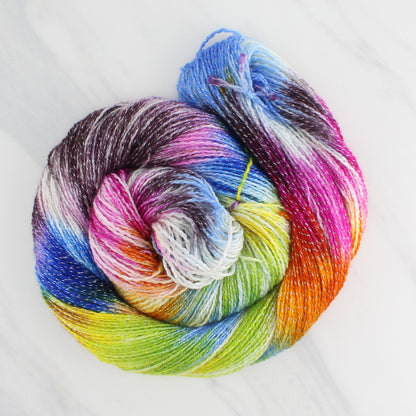 JONES' LES VENDEUSES DE TISSUE Hand Dyed on Twinkle Fingering  - Block Variegated Yarn