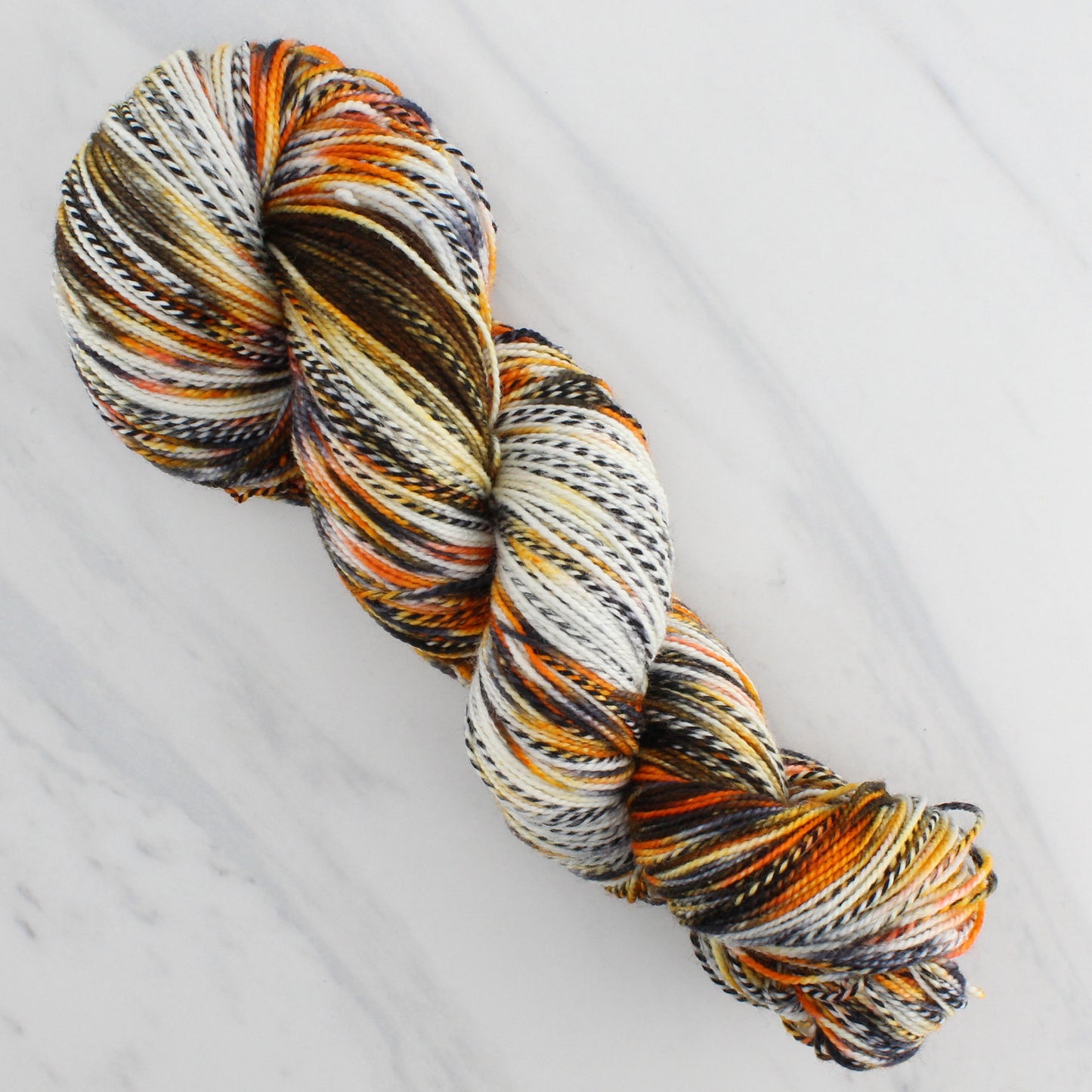 QUINO CHECKERSPOT BUTTERFLY Hand Dyed on Stained Glass Fingering - Splashed & Speckled Yarn