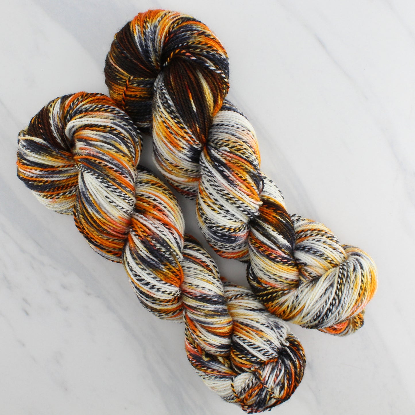 QUINO CHECKERSPOT BUTTERFLY Hand Dyed on Stained Glass Fingering - Splashed & Speckled Yarn