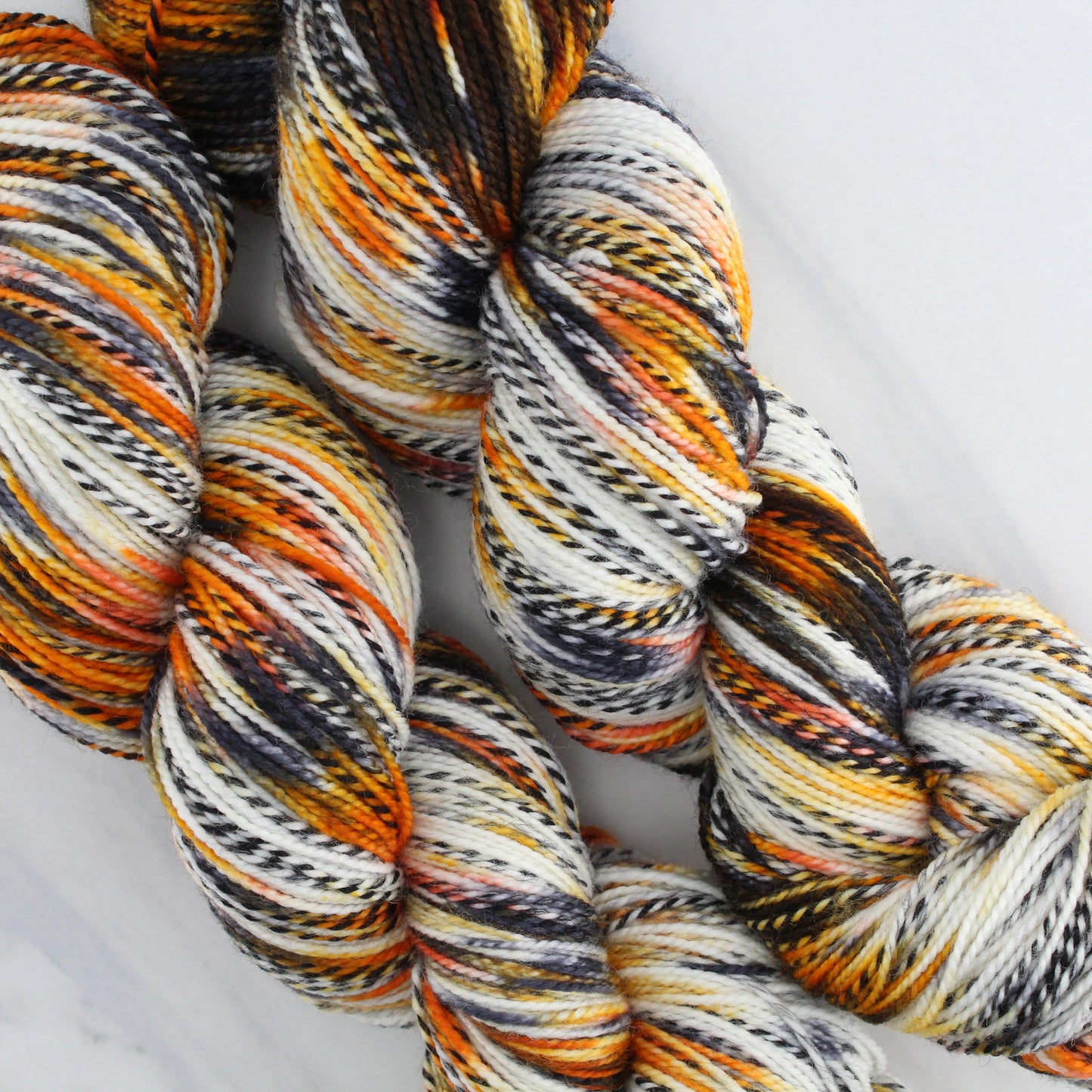 QUINO CHECKERSPOT BUTTERFLY Hand Dyed on Stained Glass Fingering - Splashed & Speckled Yarn