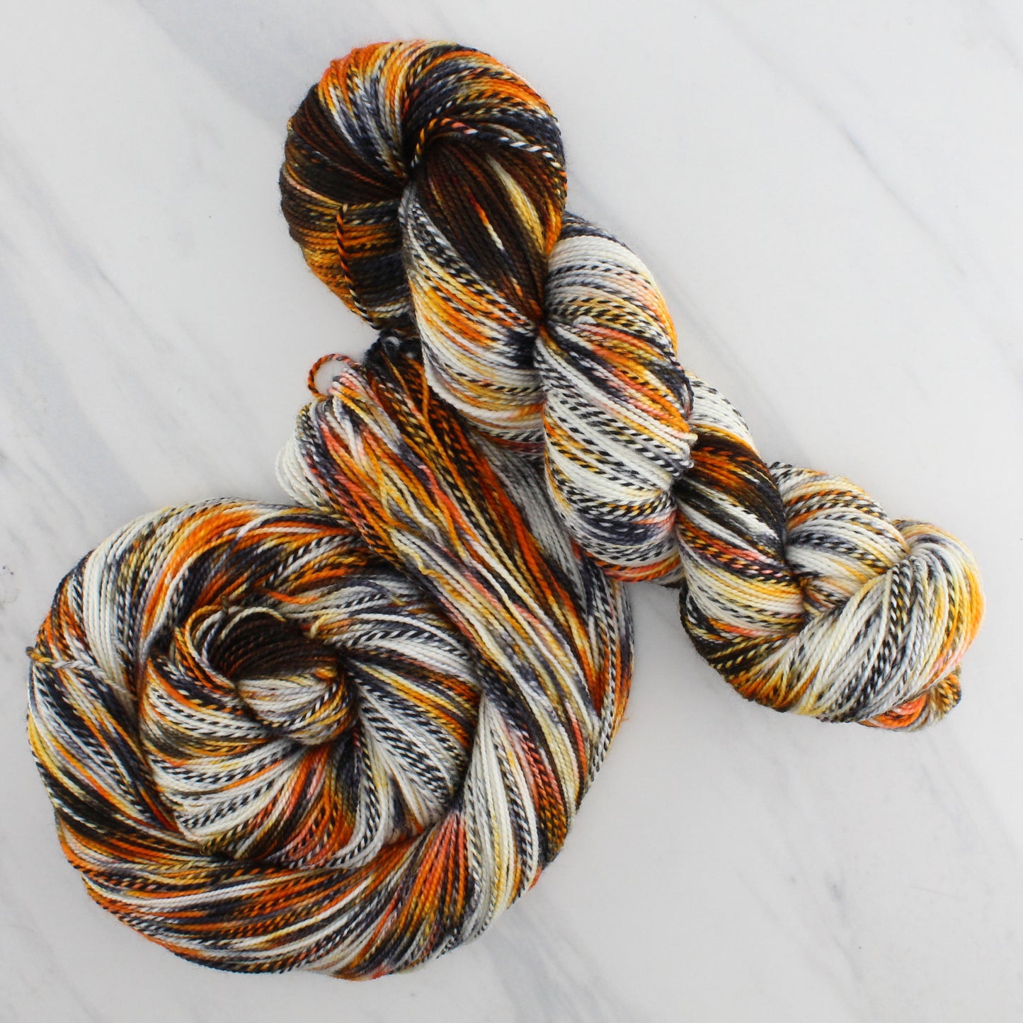 QUINO CHECKERSPOT BUTTERFLY Hand Dyed on Stained Glass Fingering - Splashed & Speckled Yarn