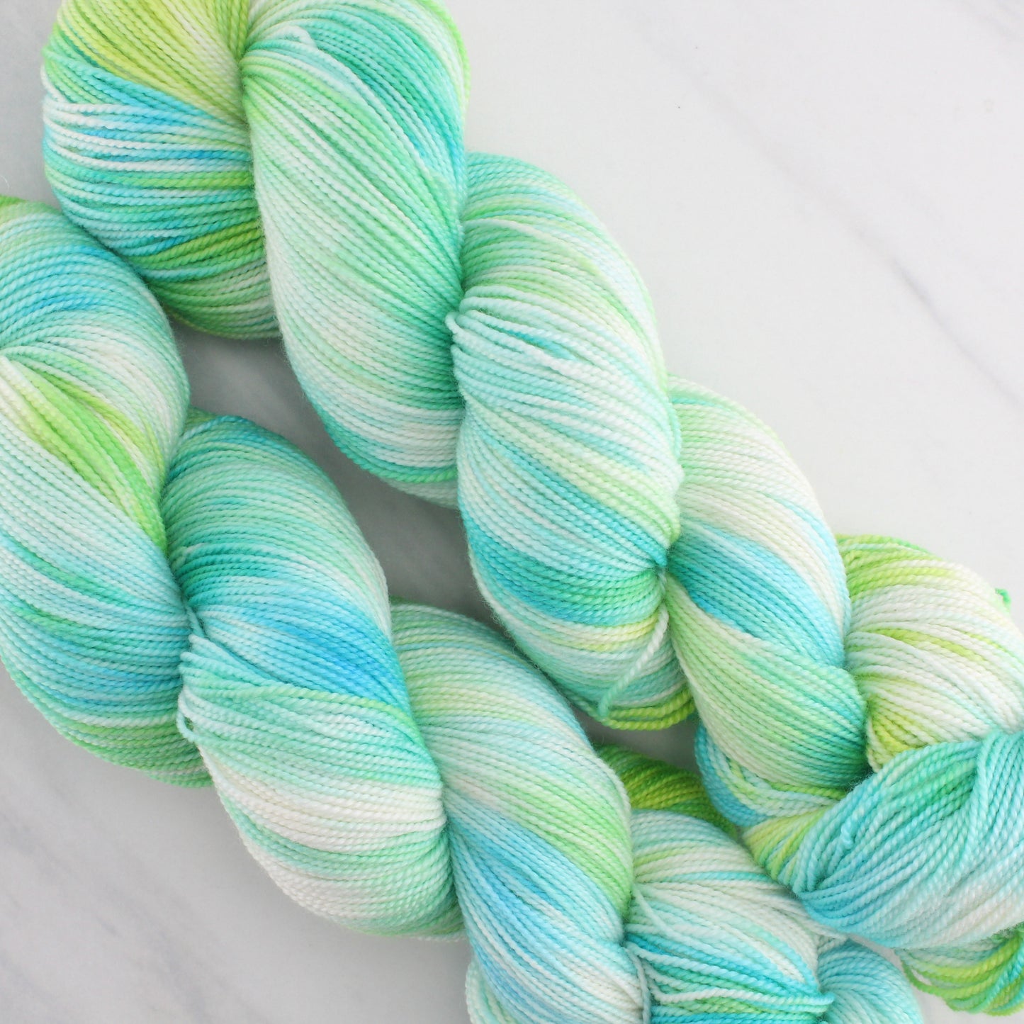 SEA GLASS Hand Dyed on Feather Fingering - Splashed & Speckled Yarn
