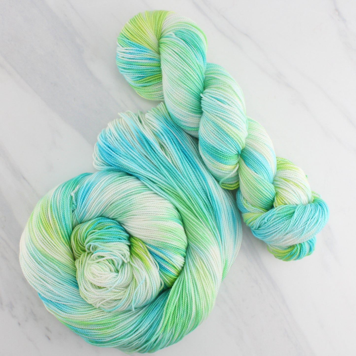 SEA GLASS Hand Dyed on Feather Fingering - Splashed & Speckled Yarn