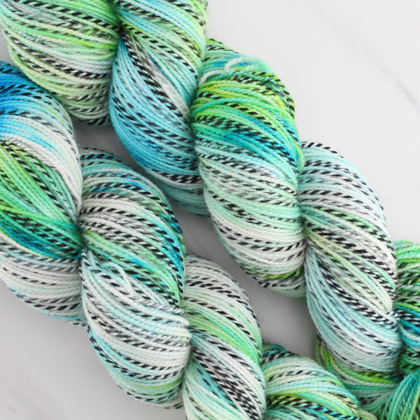 SEA GLASS Hand Dyed on Stained Glass Fingering - Splashed & Speckled Yarn