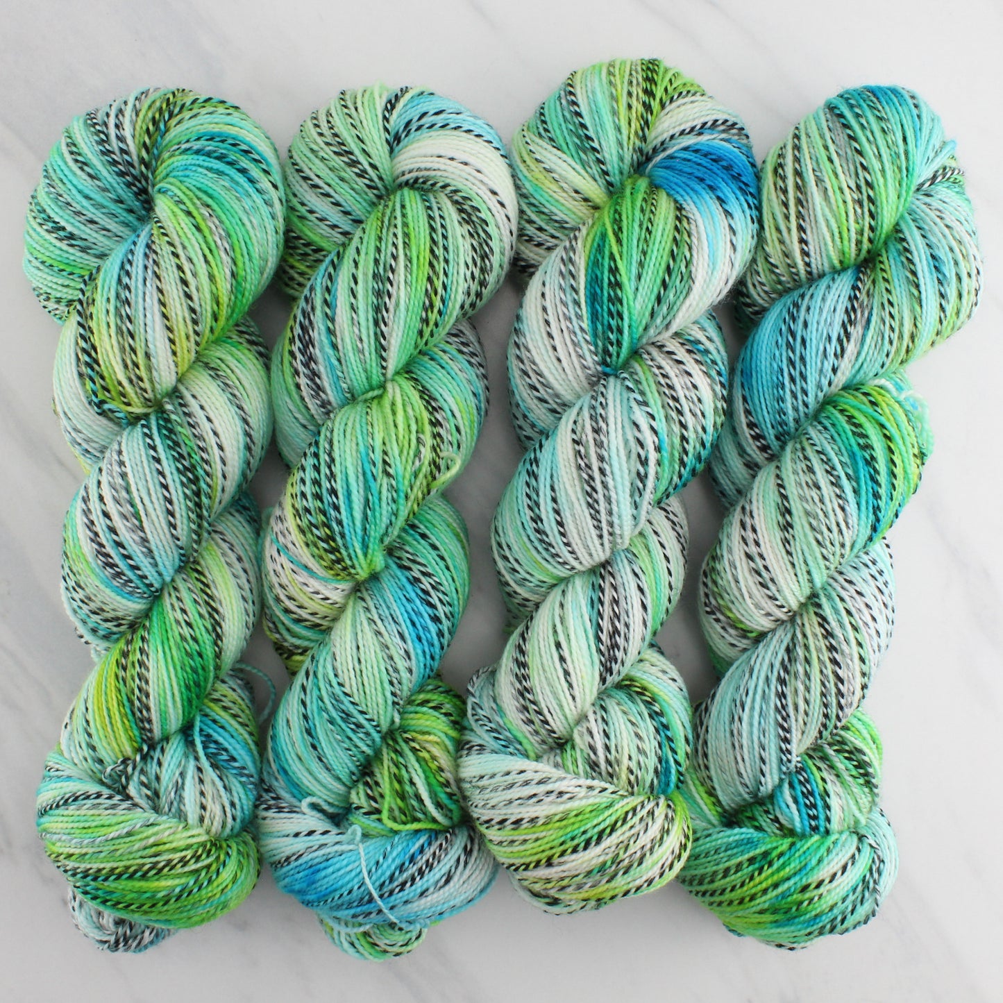 SEA GLASS Hand Dyed on Stained Glass Fingering - Splashed & Speckled Yarn