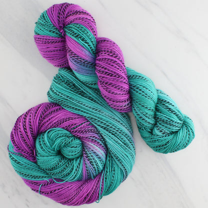 TURQUOISE AND AMETHYST Hand Dyed on Stained Glass Fingering - Assigned Pooling Colorway