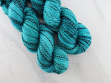 TURQUOISE Hand-Dyed Yarn on Stained Glass Sock