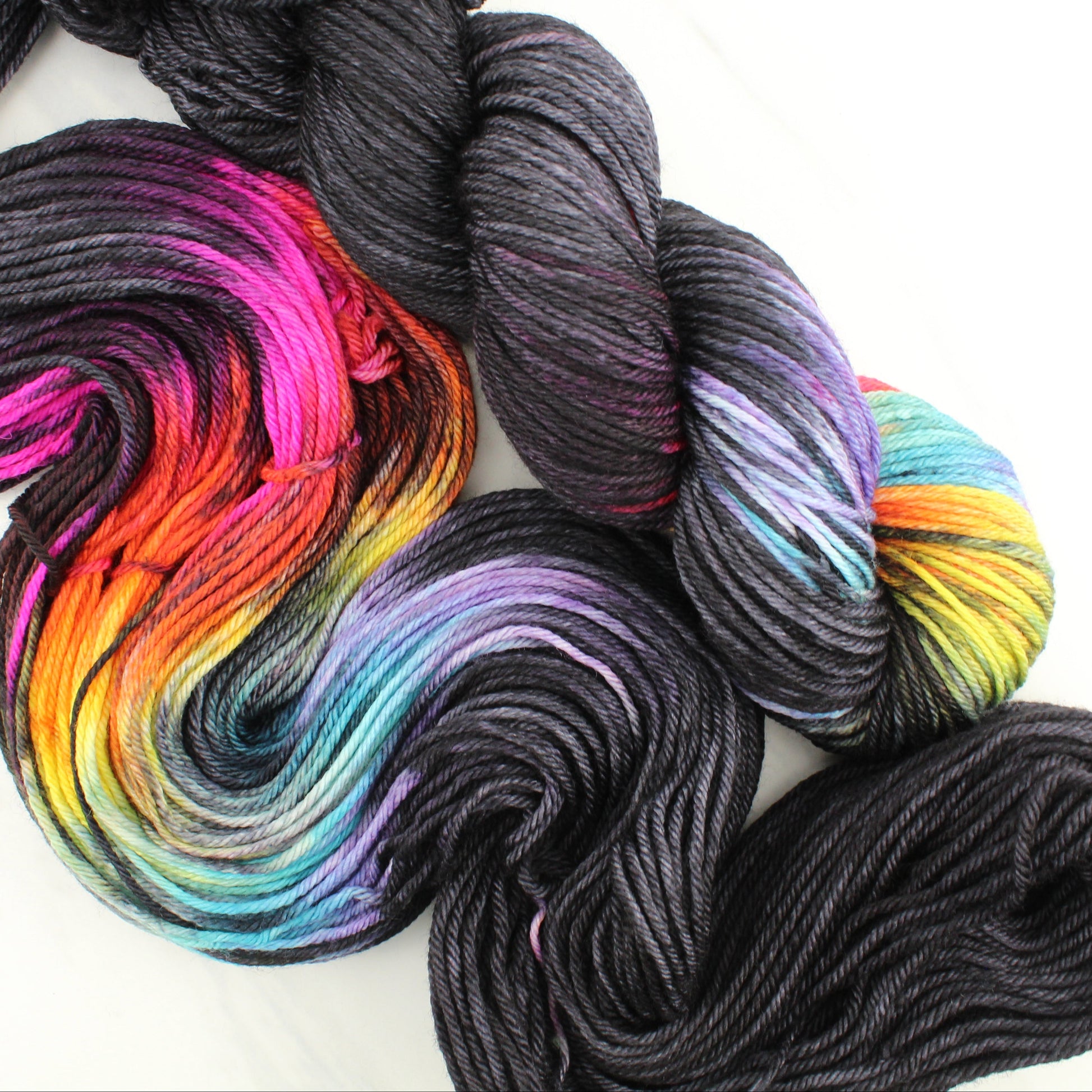 A LIGHT IN DARK PLACES on Wonderful Worsted - Assigned Pooling Colorway - Purple Lamb