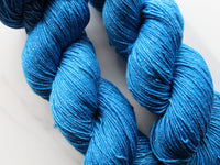 BRILLIANT BLUE on Sparkly Merino Sock-Weight Yarn - Purple Lamb