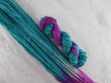 EMERALD AND AMETHYST on Stained Glass Sock - Assigned Pooling Colorway