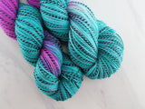 EMERALD AND AMETHYST on Stained Glass Sock - Assigned Pooling Colorway