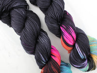 A LIGHT IN DARK PLACES on Indie-Dyed Yarn on Squoosh DK - Purple Lamb